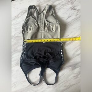 Set of 2 Fabletics sports bras. Size medium with pads.
